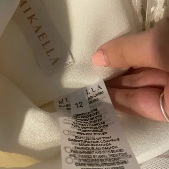 Brand new never worn before Mikaella wedding gown